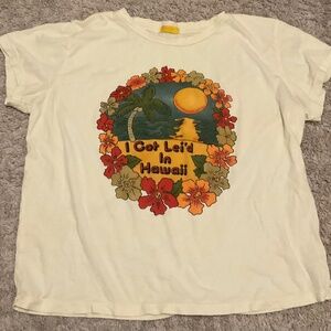 MOTHER THE BOXY GOODIE GOODIE I GOT LIE'D IN HAWAII T-SHIRT. SIZE: L. YELLOW.